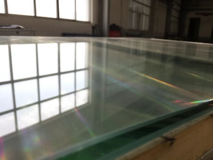 Low-E coated glass with visible spectral reflection